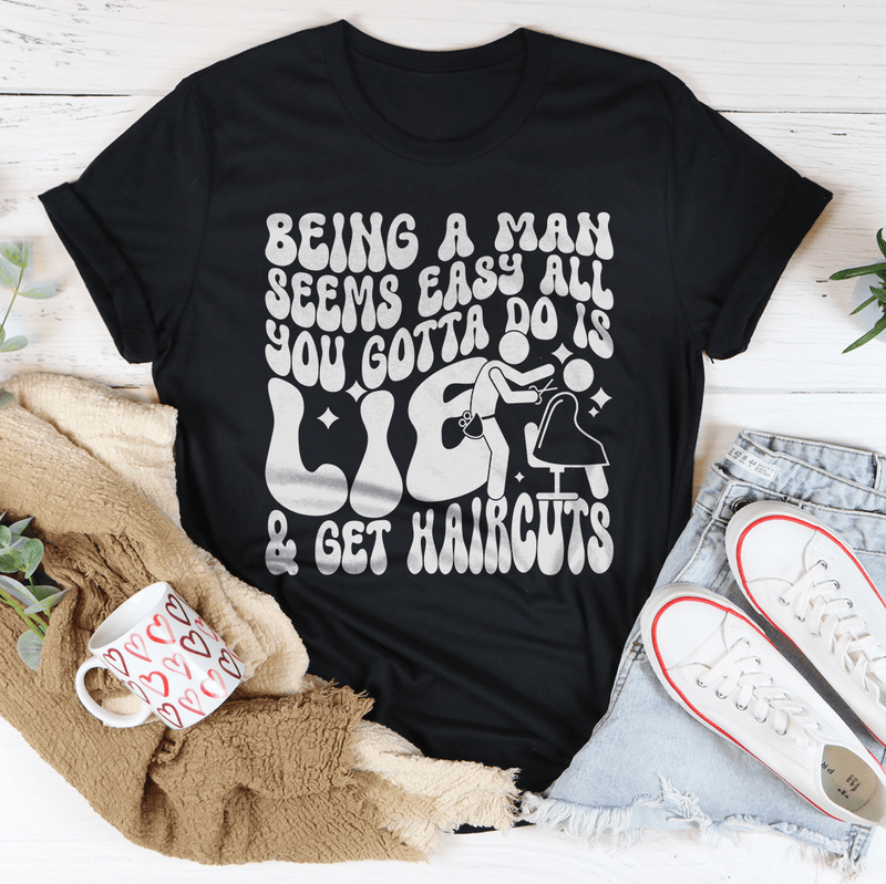 Being A Man Seems Easy All You Gotta Do Is Lie And Get Haircuts Tee Black Heather / S Peachy Sunday T-Shirt