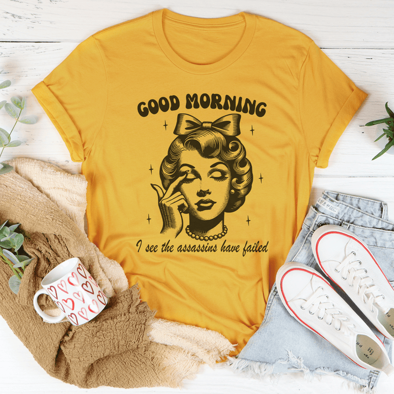 Good Morning I See The Assassins Have Failed Tee Mustard / S Peachy Sunday T-Shirt