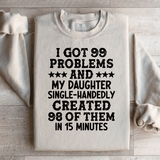 I Got 99 Problems And My Daughter Single-Handedly Created 98 Of Them Sweatshirt Sand / S Peachy Sunday T-Shirt