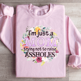 I'm Just A Mom Trying Not To Raise A holes Sweatshirt Light Pink / S Peachy Sunday T-Shirt