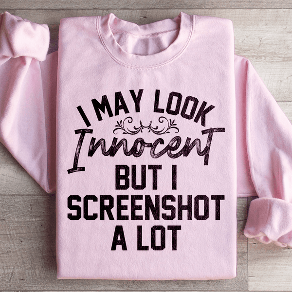 I May Look Innocent But I Screenshot A Lot Sweatshirt Light Pink / S Peachy Sunday T-Shirt