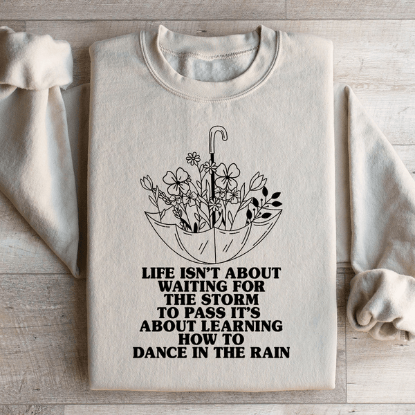 Life Isn't About Waiting For The Storm To Pass Sweatshirt Sand / S Peachy Sunday T-Shirt