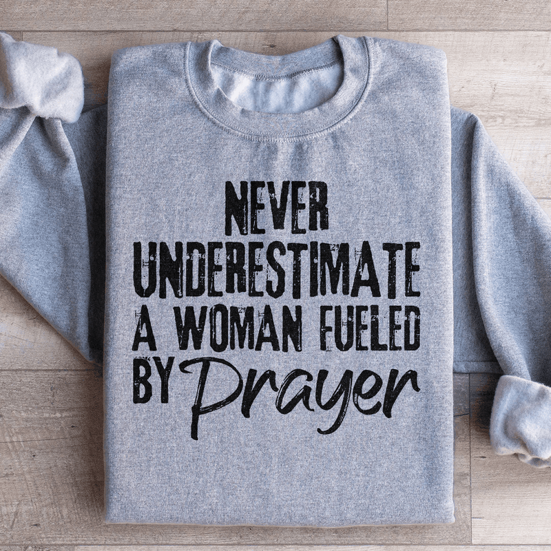 Never Underestimate A Woman Fueled By Prayer Sweatshirt Sport Grey / S Peachy Sunday T-Shirt