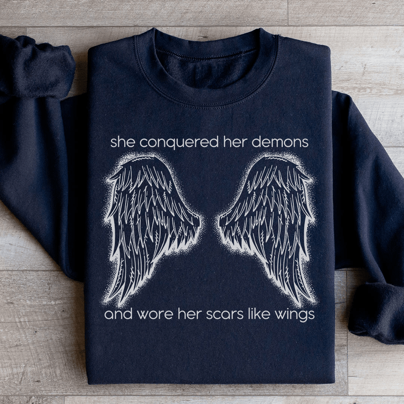 She Conquered Her Demons And Wore Her Scars Like Wings Sweatshirt Black / S Peachy Sunday T-Shirt