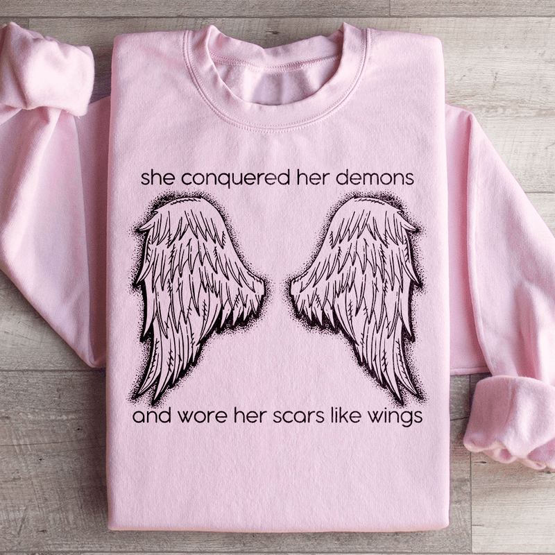 She Conquered Her Demons And Wore Her Scars Like Wings Sweatshirt Light Pink / S Peachy Sunday T-Shirt