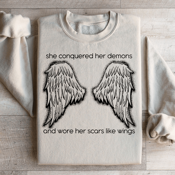 She Conquered Her Demons And Wore Her Scars Like Wings Sweatshirt Sand / S Peachy Sunday T-Shirt