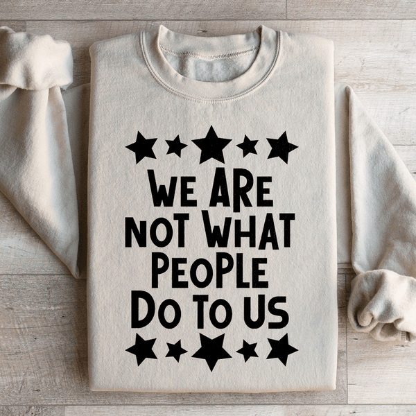 We Are Not What People Do To Us Sweatshirt Sand / S Peachy Sunday T-Shirt