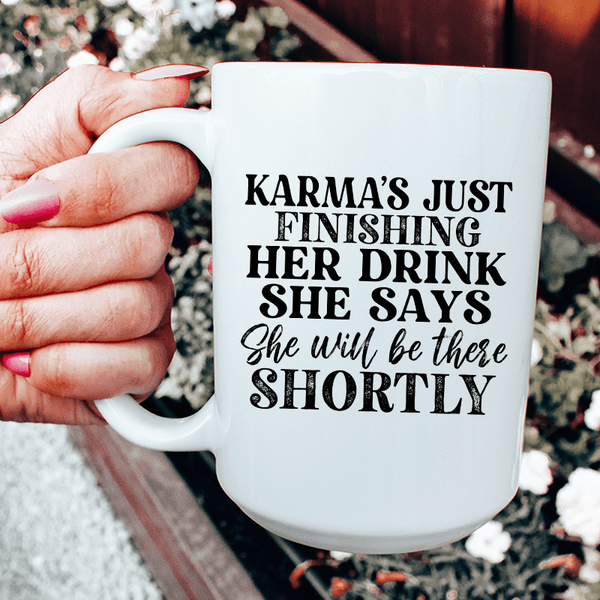 Karma's Just Finishing Her Drink She Says She Will Be There Shortly Ceramic Mug 15 oz White / One Size CustomCat Drinkware T-Shirt