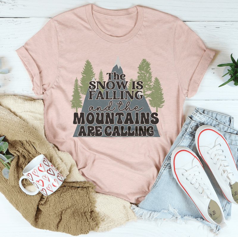 The Snow Is Falling And The Mountains Are Calling Tee Peachy Sunday T-Shirt